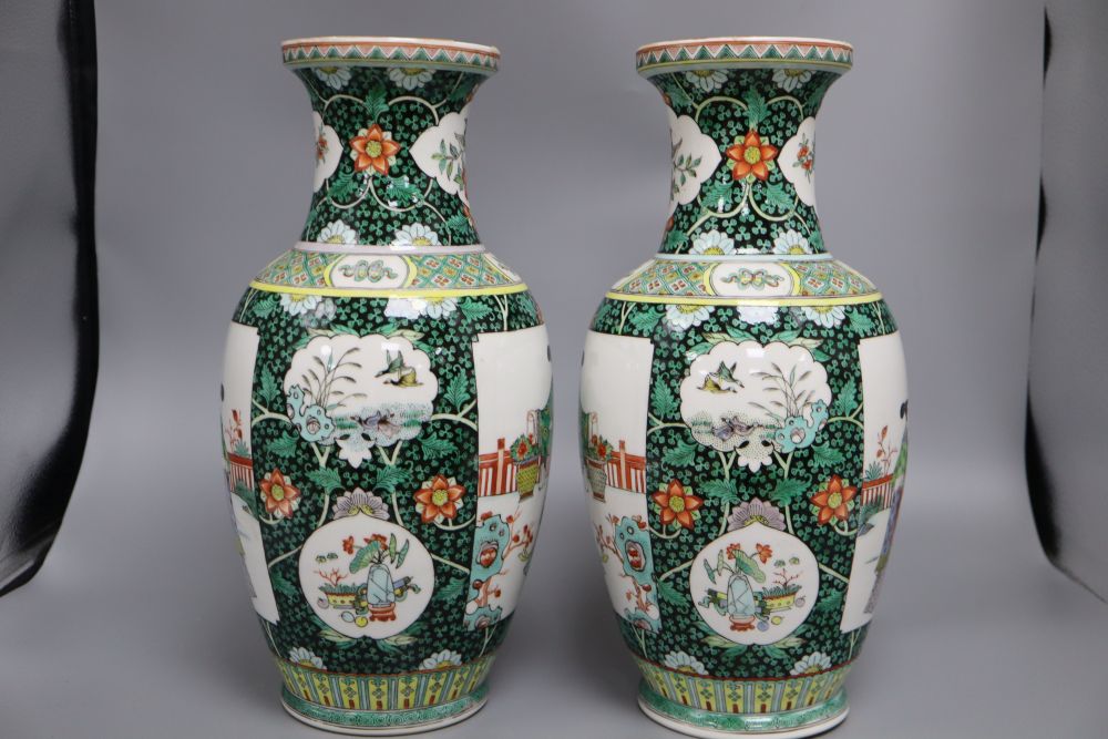 A pair of Chinese famille verte vases, height 36cm